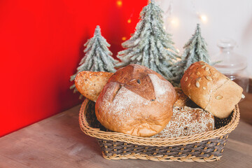 Christmas bread. buns on the table witj christmas decor.