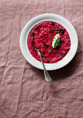 Beet root risotto with dry plums 
