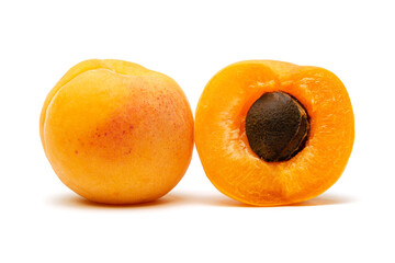 two apricots on a white background