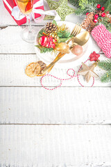 Christmas or New Year table setting. Place setting for Christmas Dinner with Xmas Holiday Decorations