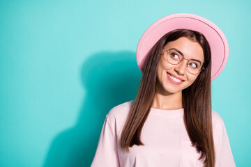 Photo of cute girl woman dressed pink retro outfit look empty space isolated teal color background