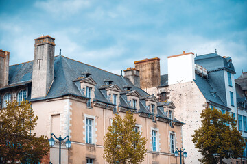 Antique building view in Paris city, France.