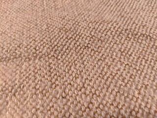 the texture of the beige linen fabric with natural