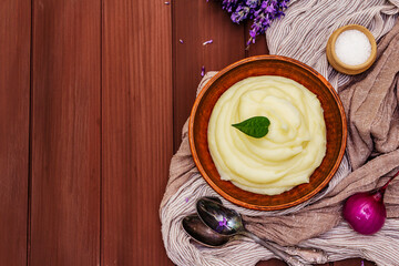Mashed potatoes in a clay bowl