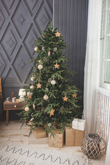 Christmas background. Christmas tree indoors. Holiday decor