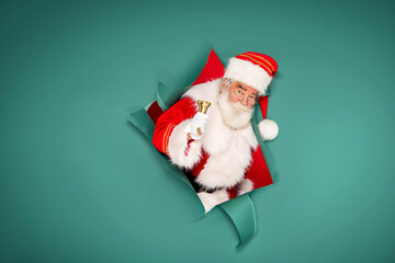 Santa Claus with golden bell