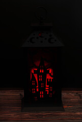 Halloween lantern with lit candle