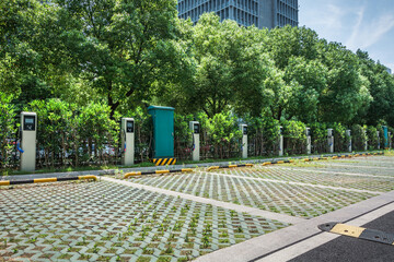 A Row of Electric Vehicle Charging Piles at Station