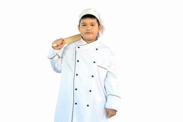 portrait asia, healthy boy in a kitchen white uniform and chef hat carry  wooden rolling pin on the shoulder (equipment for cooking) isolated on white background with clipping path & copy space
