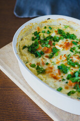 Traditional pumpkin pie with turkey and baked vegetables. 