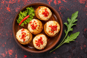 Stuffed mushrooms on cutting board