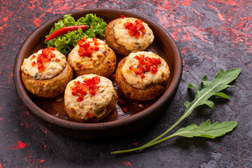 Stuffed mushrooms on cutting board