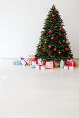 Christmas tree with gift decor for the New Year holiday winter place for inscription