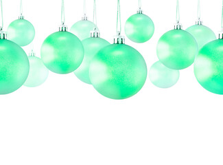 Horizontal seamless Christmas background with glass green balls isolated on white with copy space