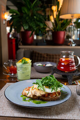 toast with boiled chicken egg and greens