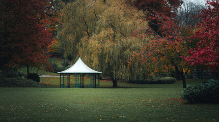The pavilion in Avenham Park, Preston, UK, surrounded by trees and autumn colors