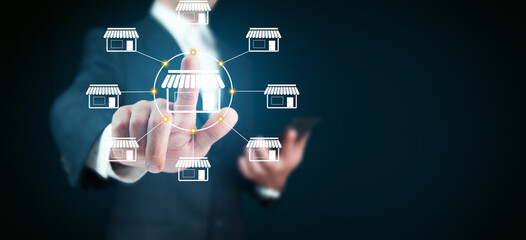 man holding phone with house in screen