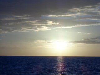 The stunning sunsets, beaches, coral reefs and huts on the Belize Islands in the Caribbean Sea