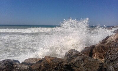 waves crashing on rocks