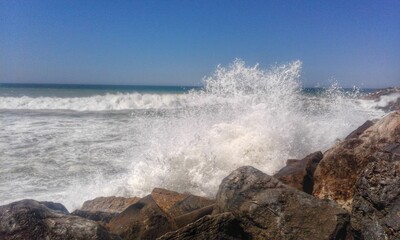 waves crashing on rocks