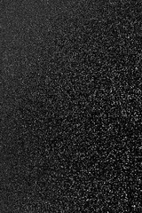 Black glitter bokeh circle glow blurred and blur abstract. Glittering shimmer bright luxury . White and silver glisten twinkle for texture wallpaper and background backdrop.
