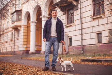 Man walks with his dog