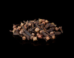 dried cloves isolated on black  background