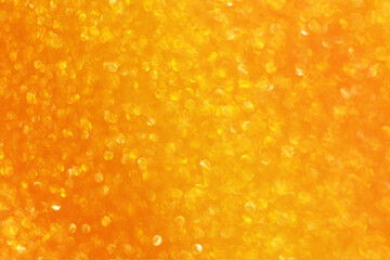 Orange glitter bokeh circle glow blurred and blur abstract. Glittering shimmer bright luxury . White and silver glisten twinkle for texture wallpaper and background backdrop.
