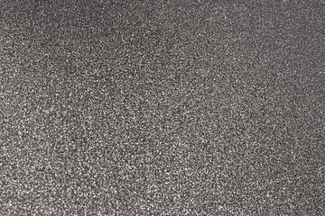 Black glitter bokeh circle glow blurred and blur abstract. Glittering shimmer bright luxury . White and silver glisten twinkle for texture wallpaper and background backdrop.
