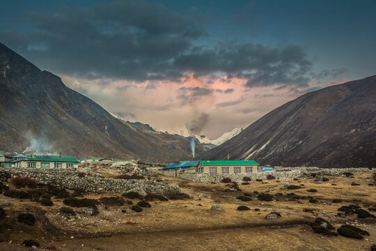 Houses of Dingboche village at sunset. Nepal Himalaya. Dingboche is a popular stop for trekkers and climbers headed to Mount Everest, Ama Dablam or Imja Tse for acclimatization purposes.