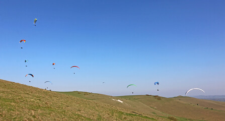 Paragliders flying at Milk Hill, Wiltshire	