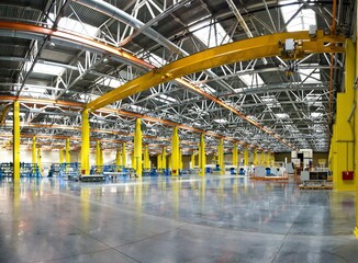 Panoramic view inside a spacious empty assembly hall (shop) in Russia.