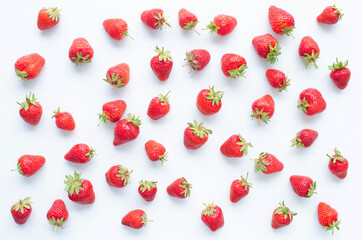 red raw fresh strawberries on white background, close view 