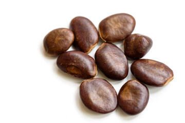 pawpaw seeds, on a white background
