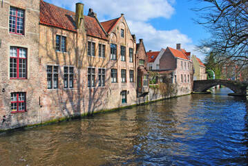 Fototapeta na wymiar Old town Bruges, Belgium. Old houses on the river channel