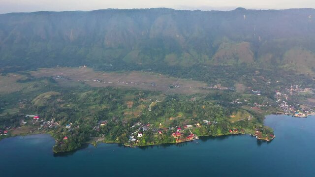 Aerial view of small villages on Samosir Island in Lake Toba in North Sumatra, Indonesia