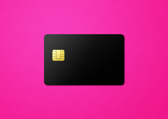 Black credit card on pink background