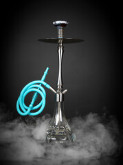 East smoking hookah. Arabian shisha. dark background with smoke