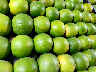 mausami fruit placed in row for sale in display