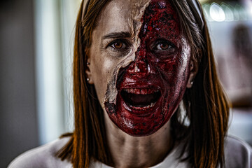 Zombie makeup on Halloween 2020. Creative art make-up for eve of All Saints Day party. Creepy...