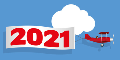 Carte de vœux humoristique, montrant un avion rouge à hélice tirant une banderole blanche, annonçant l’arrivée de l’année 2021.