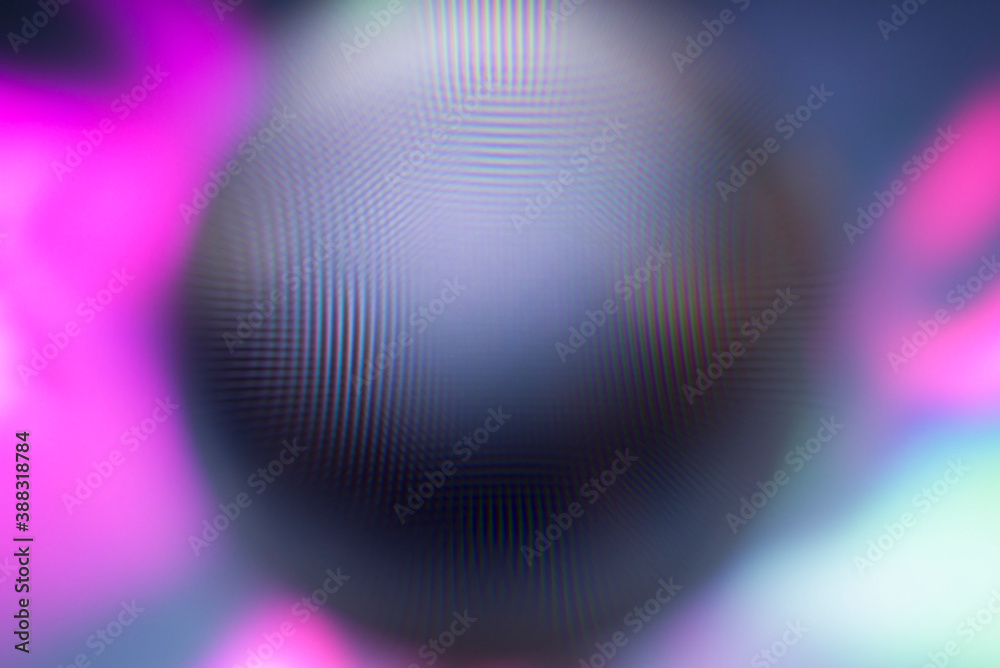 Wall mural a real photo of an abstract blurry object. an abstract blurry silhouette of a round object.