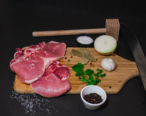 Raw meat with wooden table
