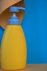 shower gel bottle on colored background
