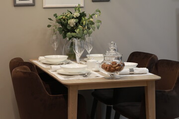 table with chairs and cutlery