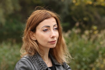 Naklejka premium Portrait of pretty woman outside
