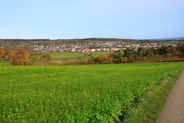 Fototapeta na wymiar Blick über das Heckengäu auf die Gemeinde Weissach im Landkreis Böblingen