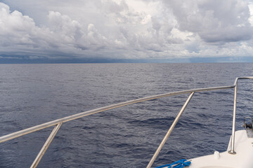 Fototapeta na wymiar yacht in the sea and clouds