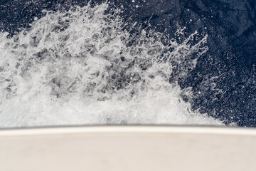 water splashing with the boat in movement