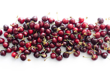 red raw fresh cherries on white background, close view 